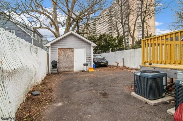 a living room filled with furniture and a car