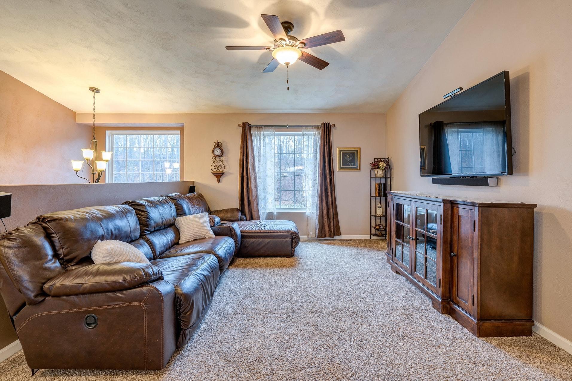 4203 Daugherty Road Salem, VA 24153 - Photo 13 of 35 a living room with furniture and a flat screen tv