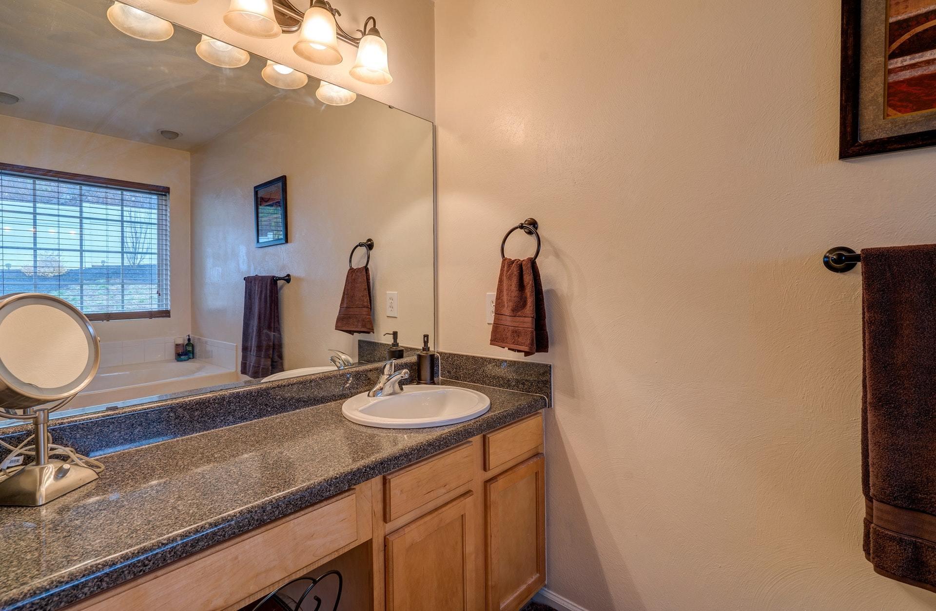 4203 Daugherty Road Salem, VA 24153 - Photo 24 of 35 a bathroom with a sink a vanity and a mirror