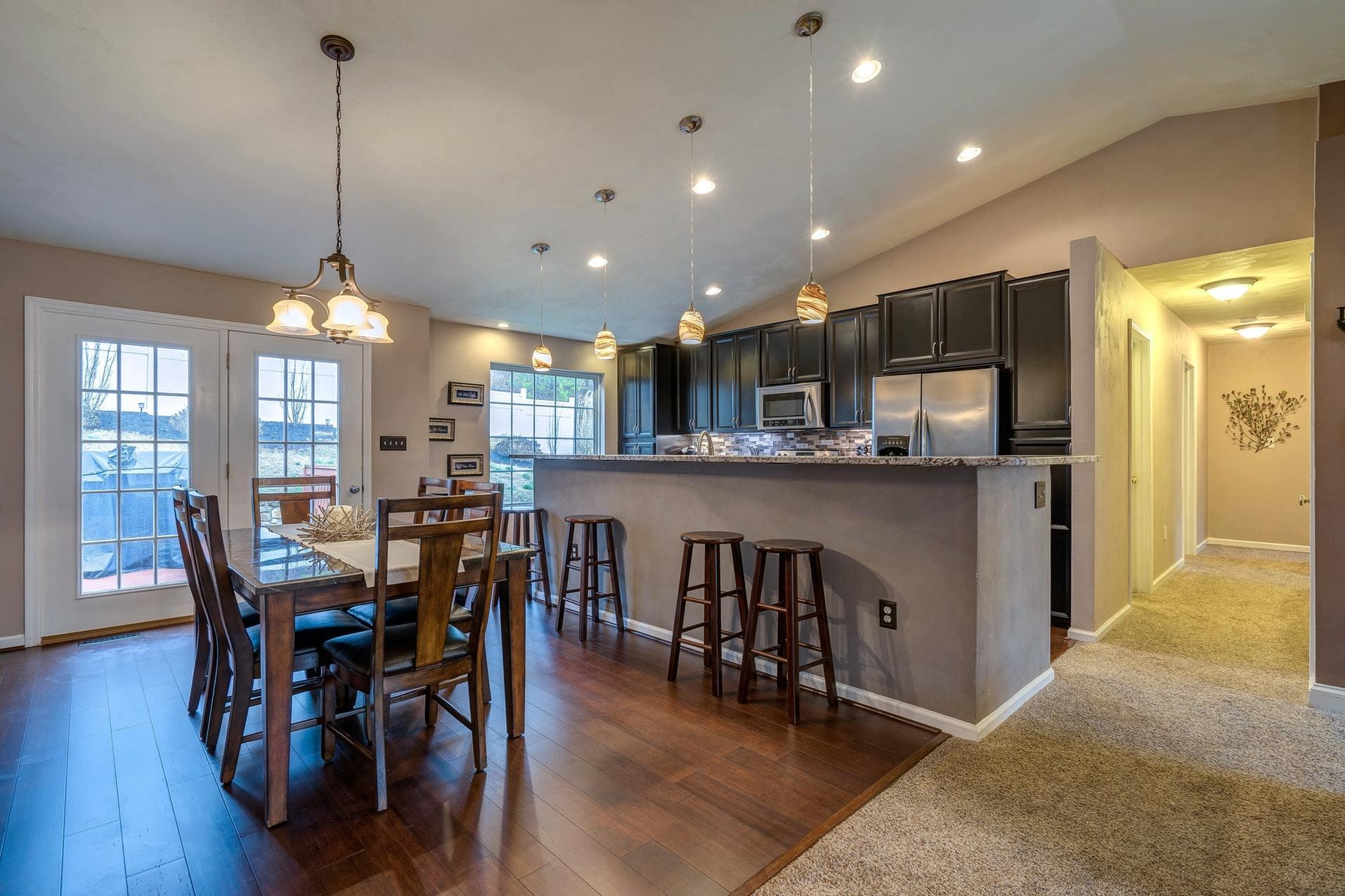 4203 Daugherty Road Salem, VA 24153 - Photo 5 of 35 a view of a dining room and livingroom with furniture wooden floor a chandelier