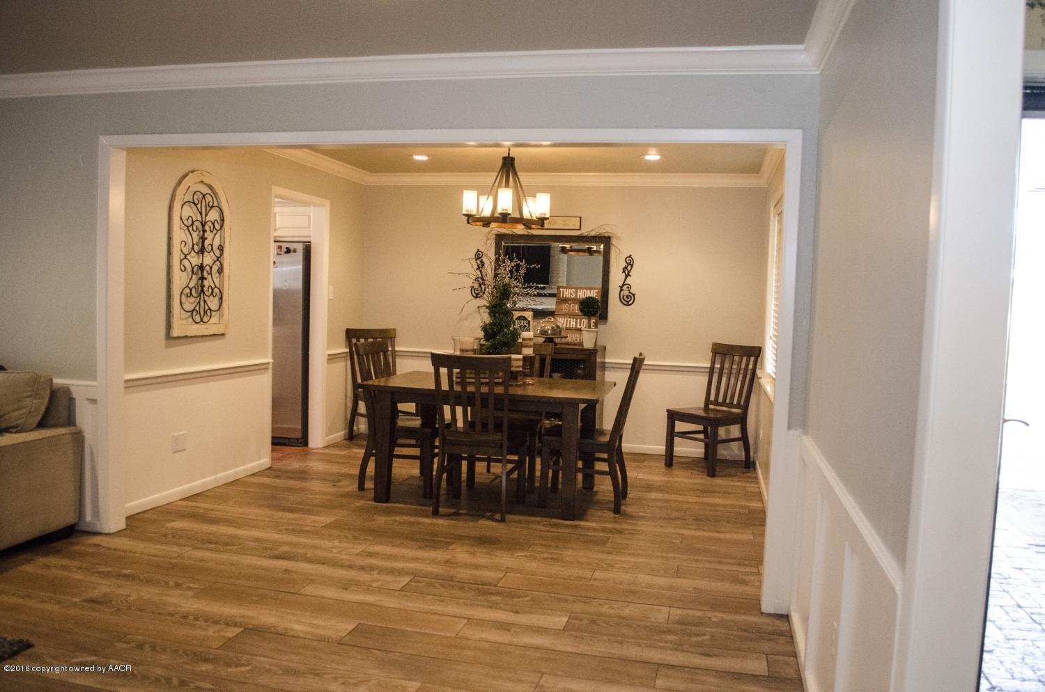 6312 Elmhurst Road Amarillo, TX 79106 - Photo 23 of 85 a dining room with furniture and window