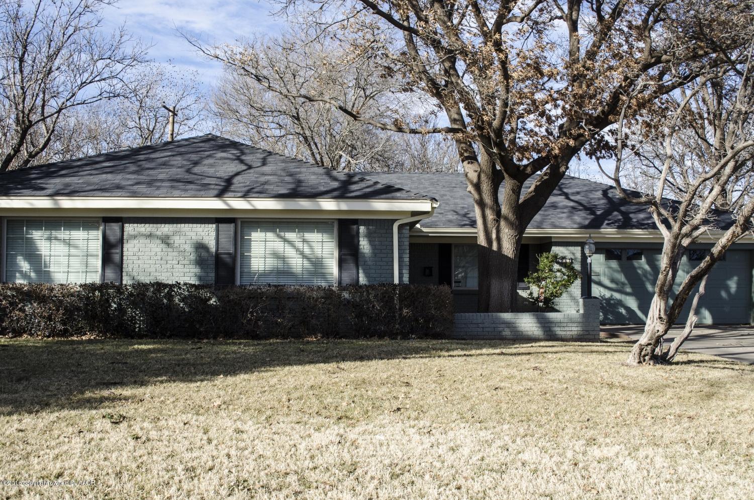 6312 Elmhurst Road Amarillo, TX 79106 - Photo 5 of 85 a front view of a house with a yard