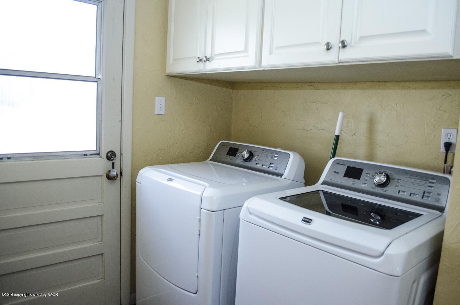 6312 Elmhurst Road Amarillo, TX 79106 - Photo 43 of 85 a utility room with dryer and washer
