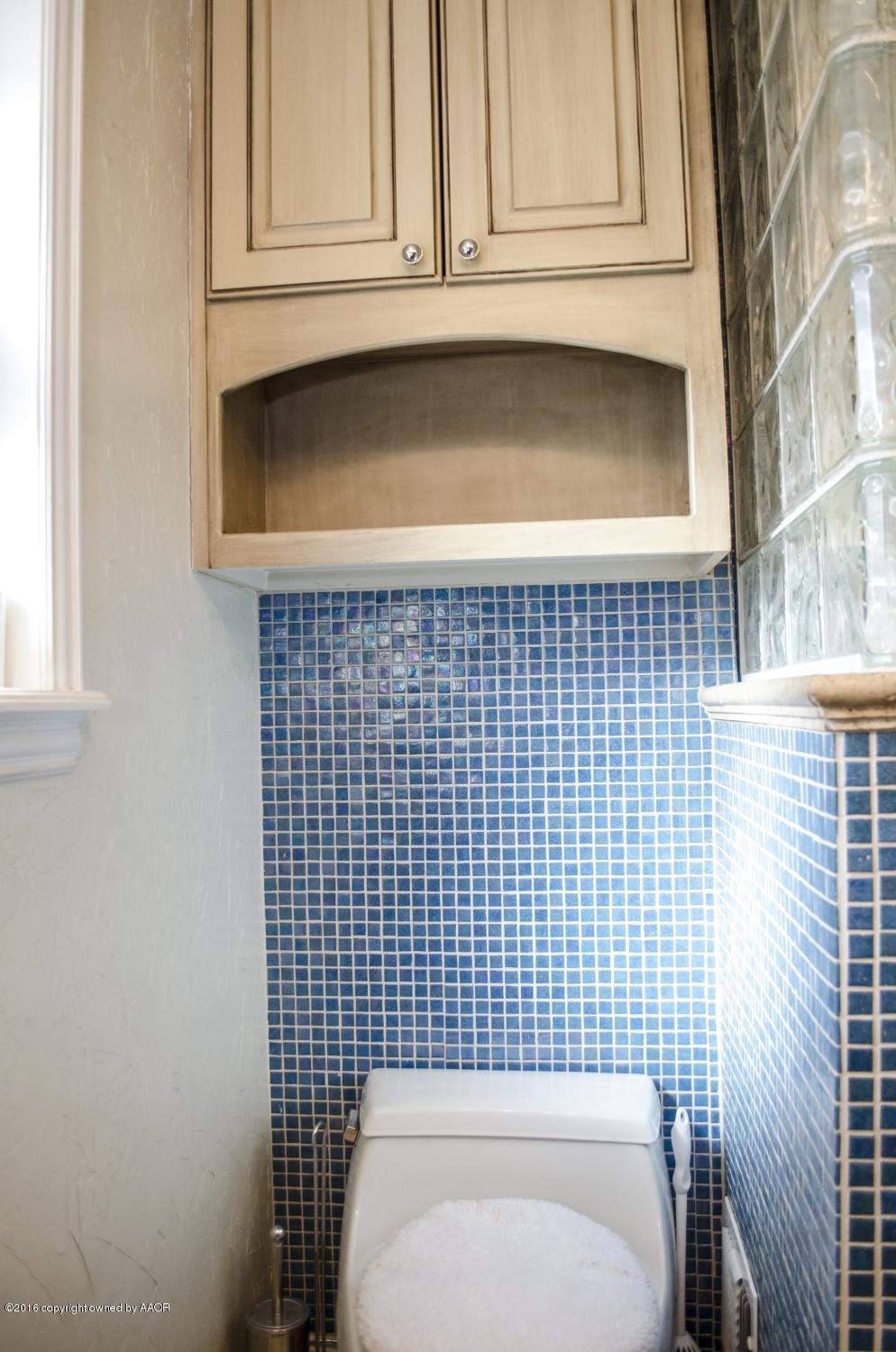 6312 Elmhurst Road Amarillo, TX 79106 - Photo 61 of 85 a bathroom with a sink