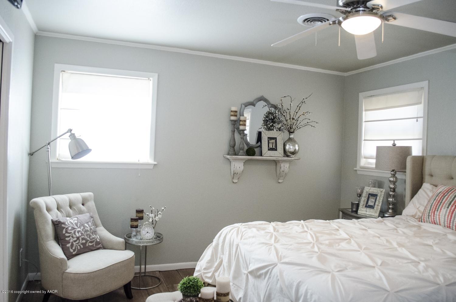 6312 Elmhurst Road Amarillo, TX 79106 - Photo 65 of 85 a bedroom with a bed and window