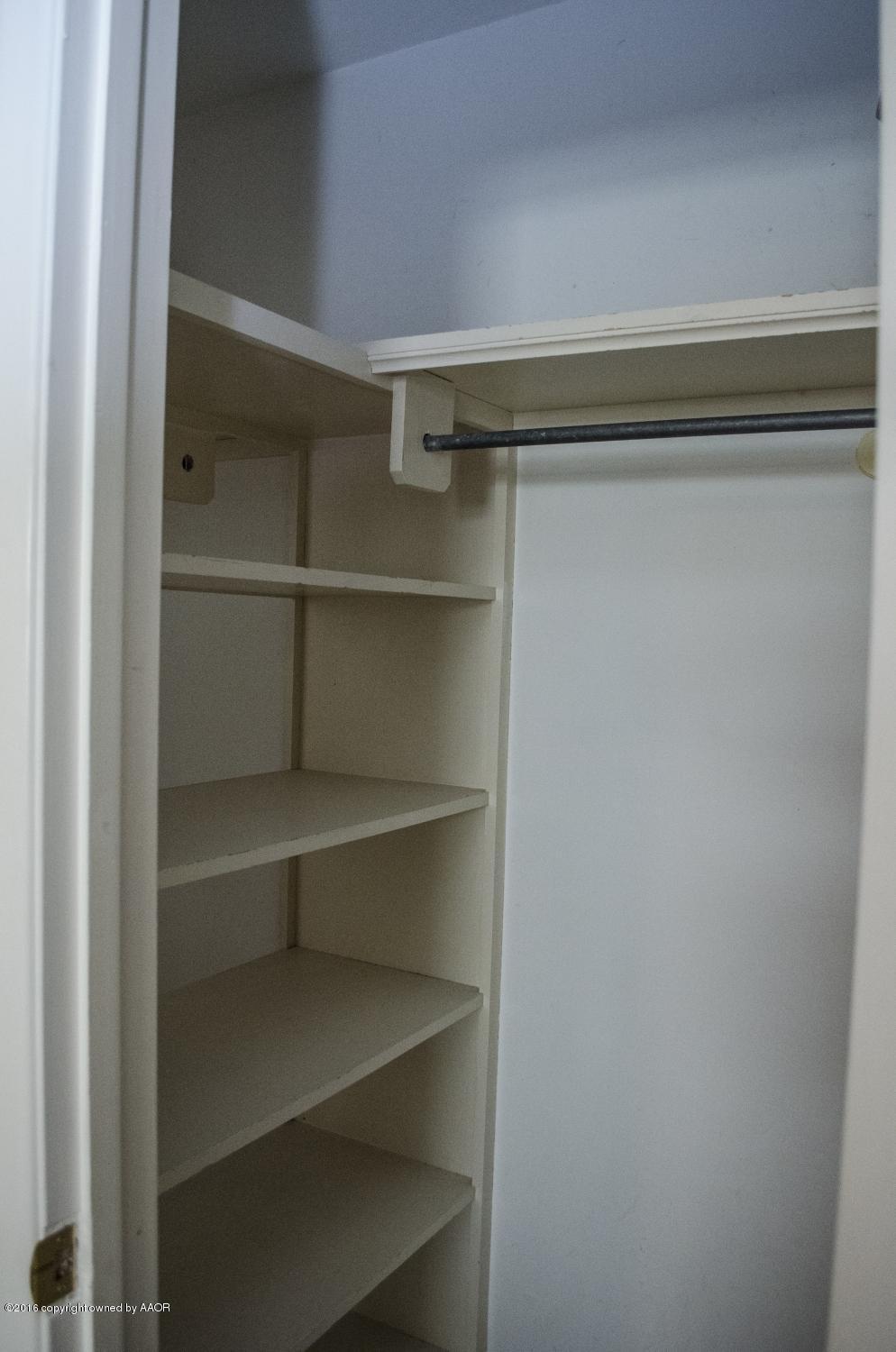 6312 Elmhurst Road Amarillo, TX 79106 - Photo 70 of 85 a view of walk in closet with empty racks