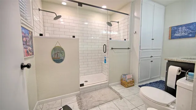 a bathroom with a sink and toilet