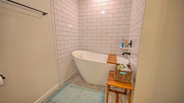a bathroom with a sink and a bathtub