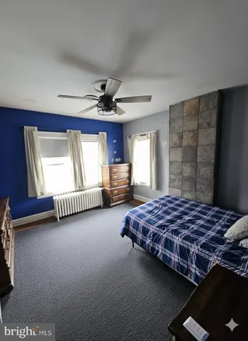 a view of a porch with wooden floor