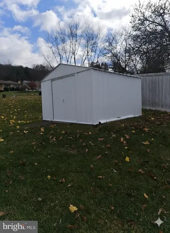 a view of a yard with an outdoor space