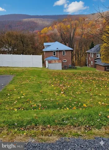 a view of outdoor space with mountain view