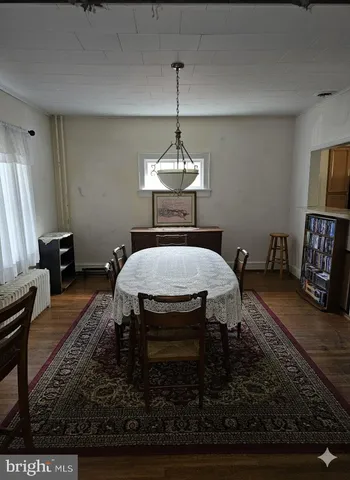 a kitchen with a stove top oven sink and cabinets