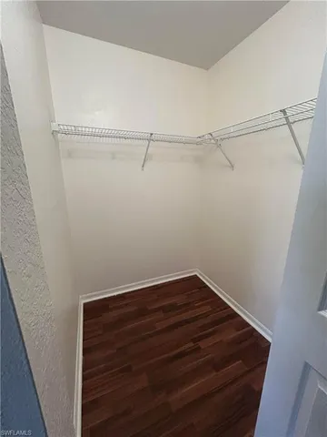 a view of small space with racks on the wall