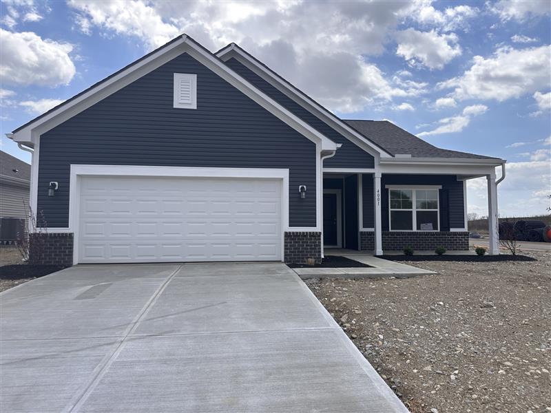 4001 Chakeres Avenue Springfield, OH 45505 - Photo 1 of 15 This newly constructed home boasts a welcoming facade with a convenient attached garage.