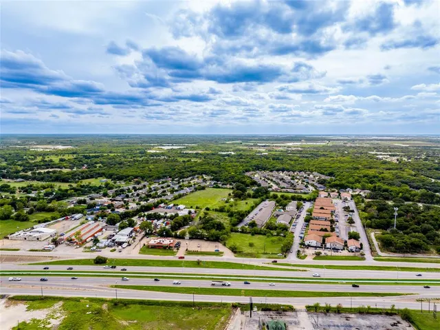 a view of a garden with an outdoor space