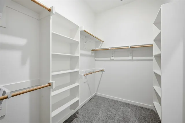 a view of an empty walk in closet