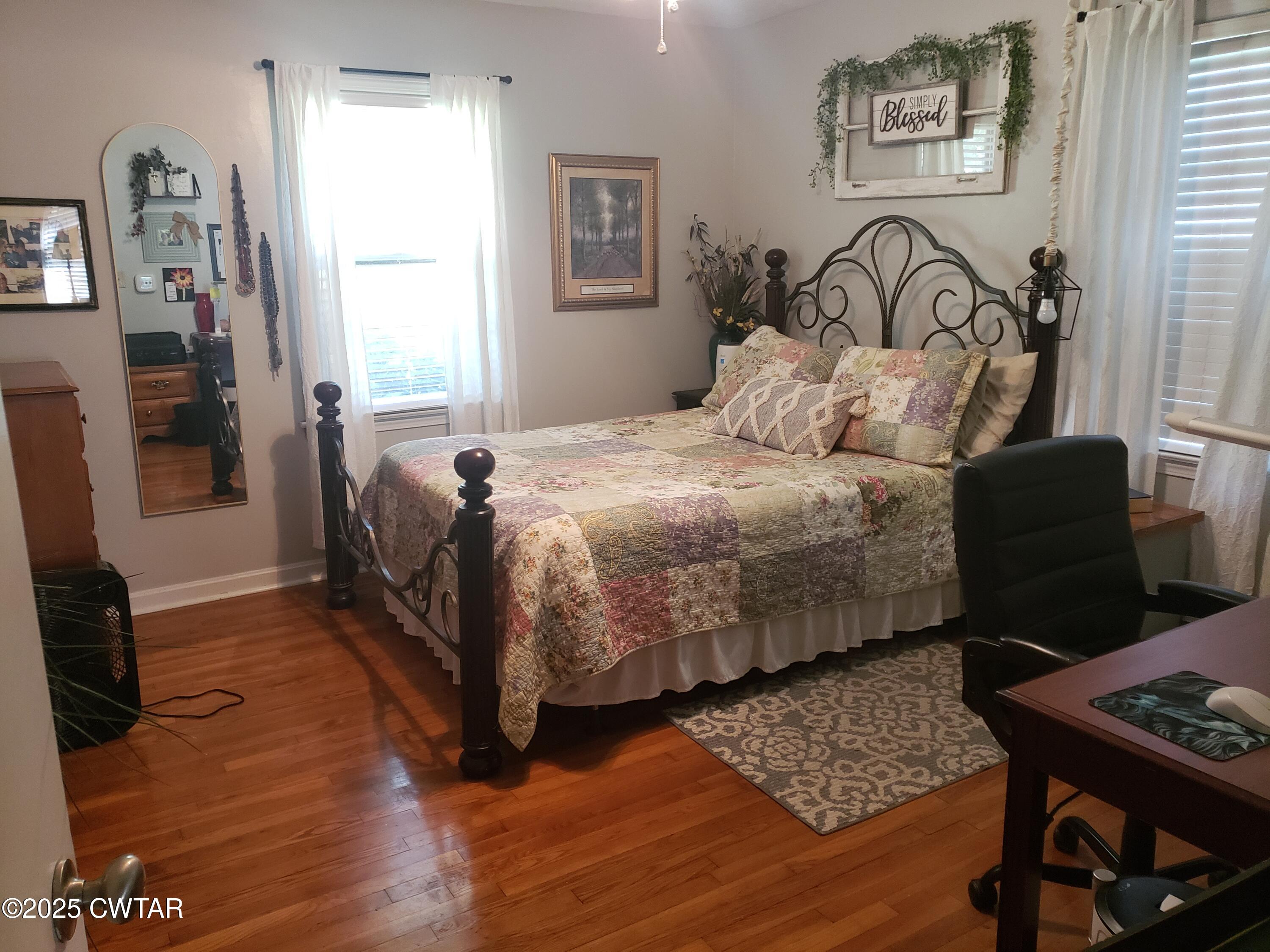 99 Montclair Drive Jackson, TN 38301 - Photo 12 of 19 a bedroom with bed and a window