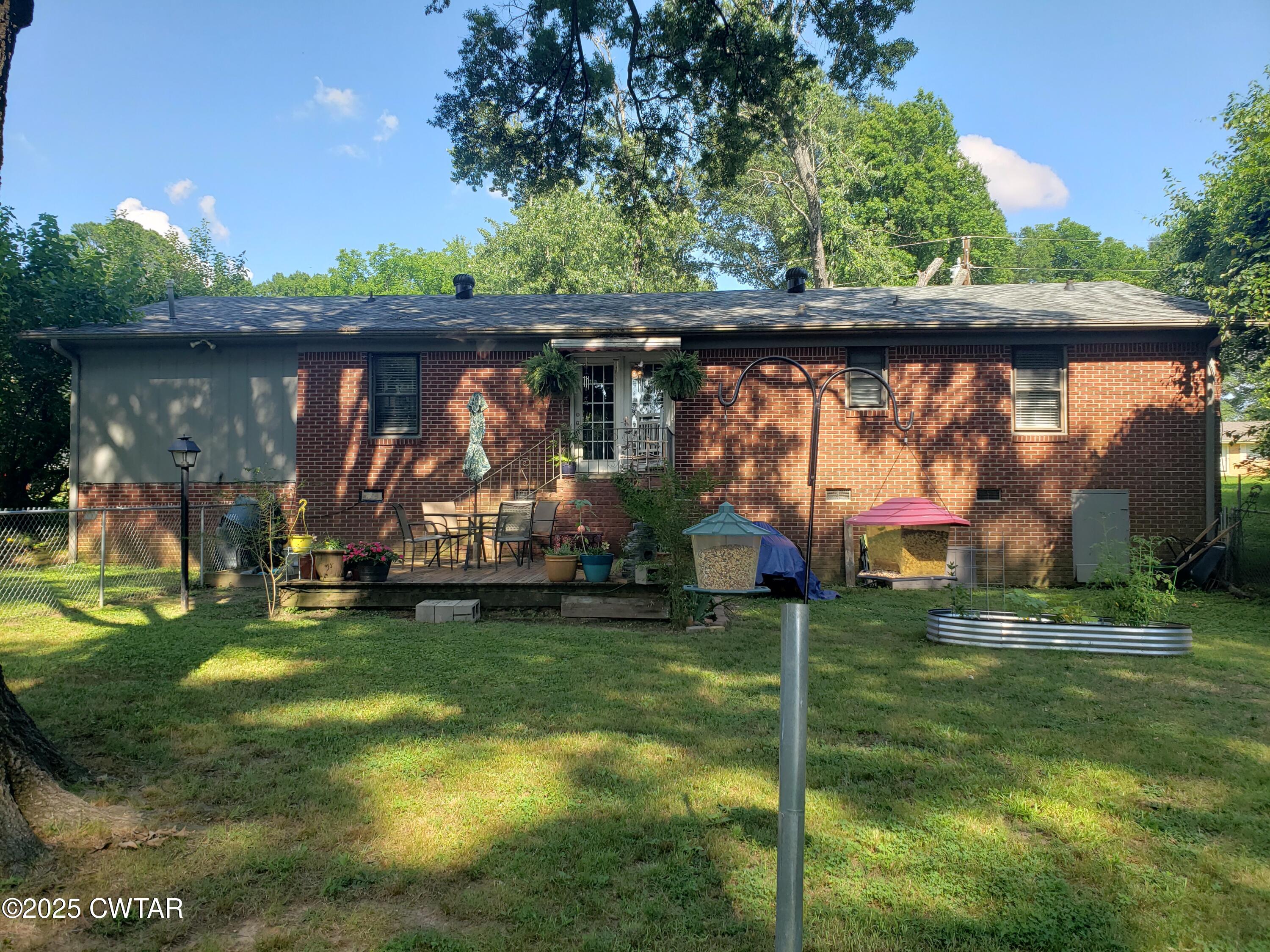 99 Montclair Drive Jackson, TN 38301 - Photo 18 of 19 a view of a park with large trees