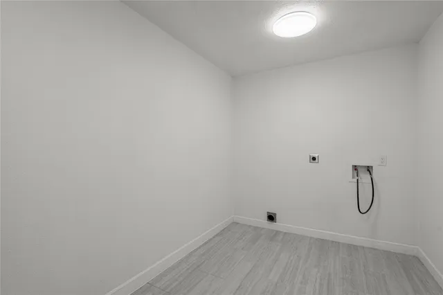 a view of a livingroom with a kitchen