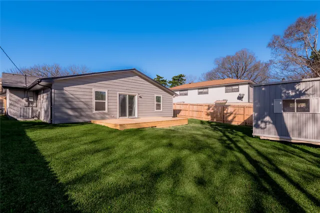 a view of backyard of house