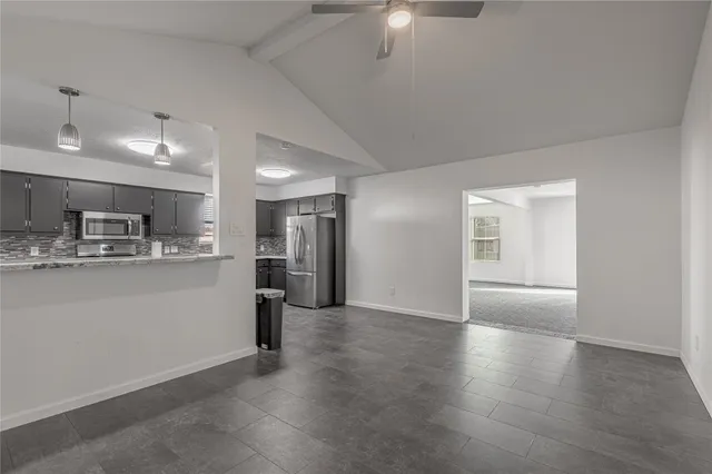 an empty room with windows