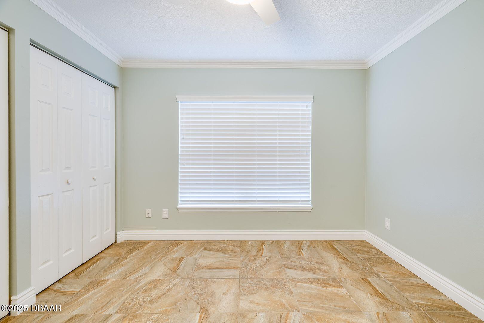 101 Bent Tree Drive, Unit 33 Daytona Beach, FL 32114 - Photo 12 of 27 a view of an empty room and window