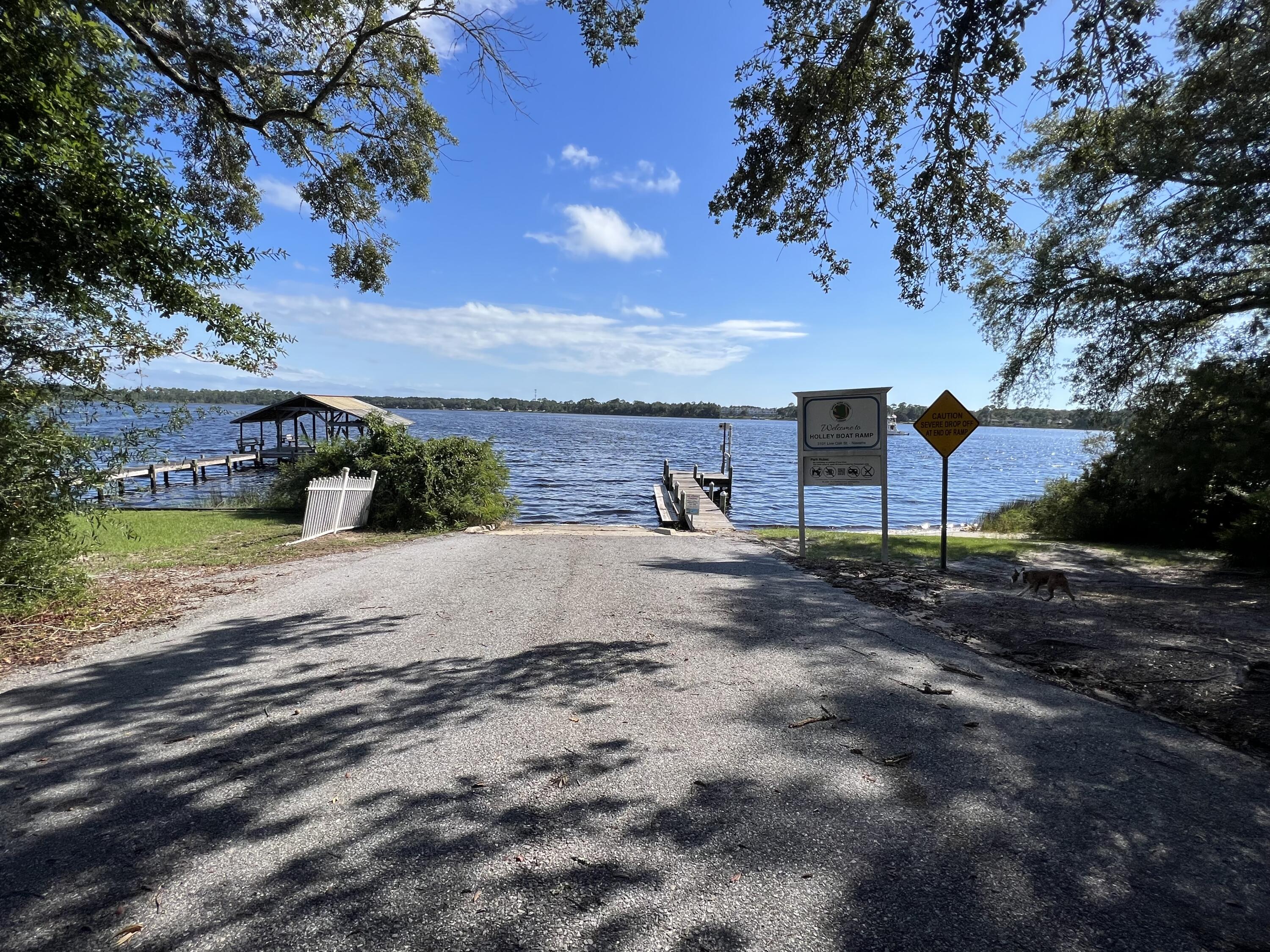 7112 Wells Avenue Navarre, FL 32566 - Photo 43 of 43 a view of a park with large trees