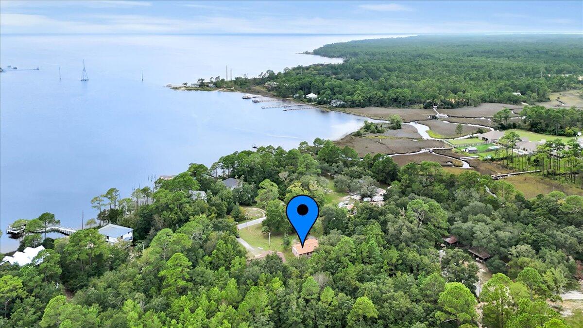 7112 Wells Avenue Navarre, FL 32566 - Photo 6 of 43 a close up of a lake view