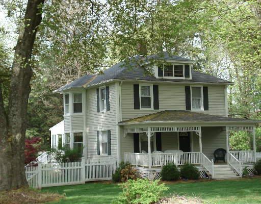 216 Whisconier Road Brookfield, CT 06804 - Photo 1 of 1 a front view of a house with a yard