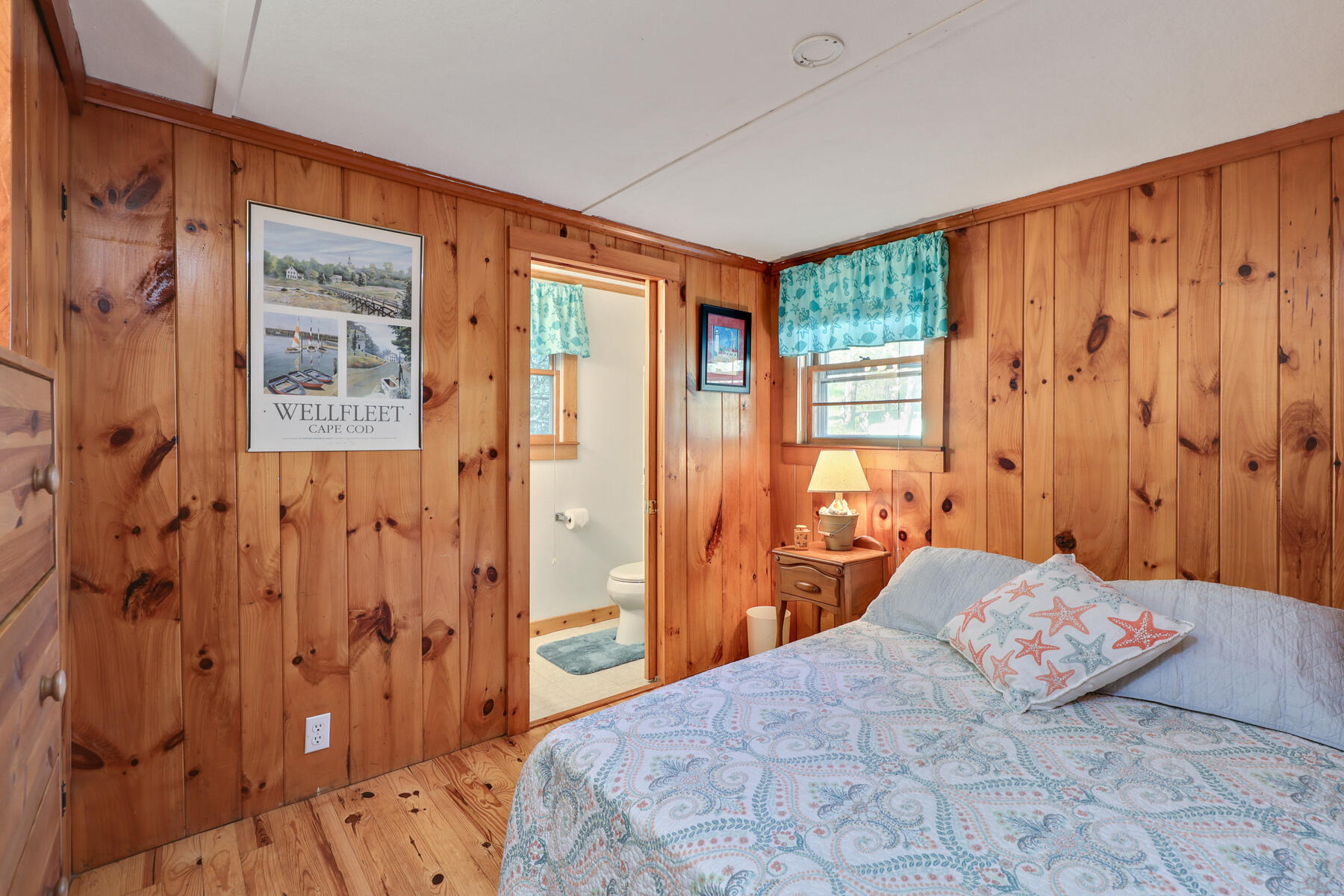 46 King Phillip Road Wellfleet, MA 02667 - Photo 13 of 32 a bedroom with a bed and a window