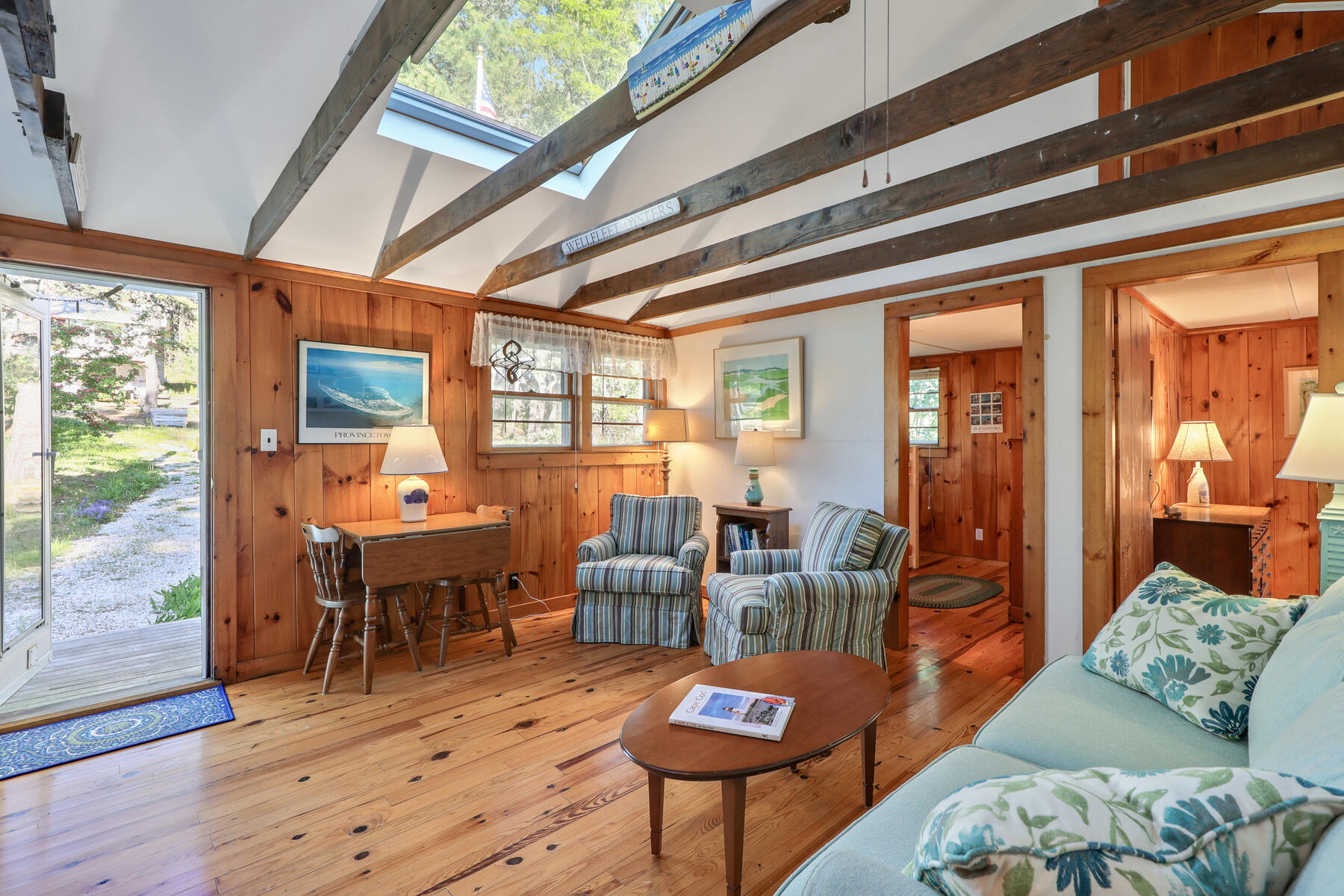 46 King Phillip Road Wellfleet, MA 02667 - Photo 7 of 32 a living room with furniture and wooden floor