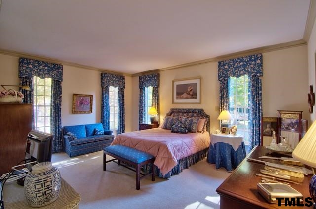 3822 Northampton Road Durham, NC 27707 - Photo 14 of 25 Spacious Master Bedroom is ideally located on main level and connects to the owner study and back hall.
