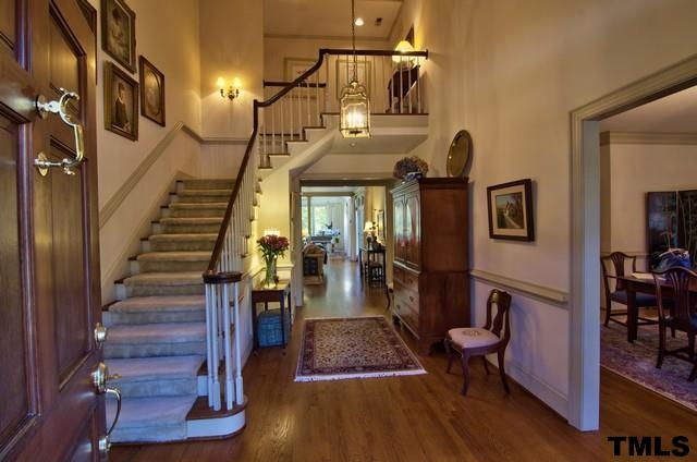 3822 Northampton Road Durham, NC 27707 - Photo 18 of 25 Wide graceful stairwell leads to two additional bedrooms, a full bath and two amazing attics.