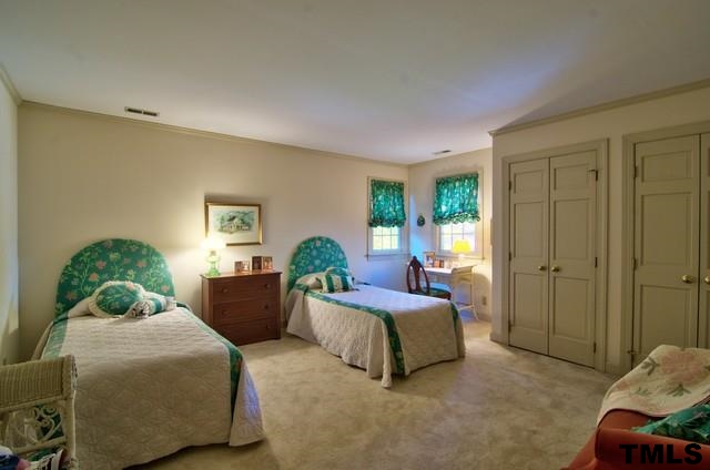 3822 Northampton Road Durham, NC 27707 - Photo 19 of 25 Large bedroom with double closets can comfortably accommodate twin beds.