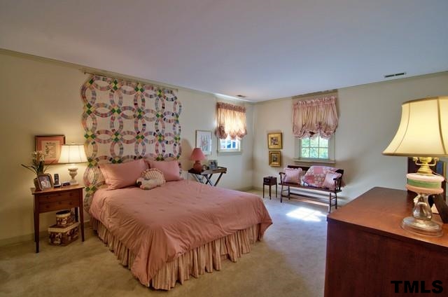 3822 Northampton Road Durham, NC 27707 - Photo 20 of 25 Another spacious bedroom also has great closet space and pretty view of backyard.
