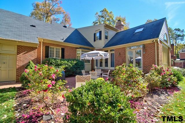 3822 Northampton Road Durham, NC 27707 - Photo 21 of 25 Pretty backyard is surrounded by hardwoods. The terrace is nestled into the landscape with shrubs including camellias, 62 azaleas, and hollies.