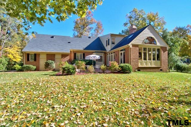 3822 Northampton Road Durham, NC 27707 - Photo 22 of 25 Large, level and private yard is a great discovery behind this pretty home.