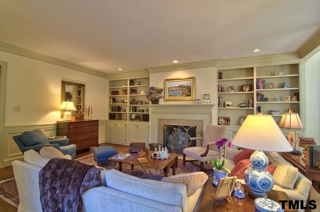 3822 Northampton Road Durham, NC 27707 - Photo 4 of 25 Note the beautiful millwork and abundant bookshelves framing fireplace.
