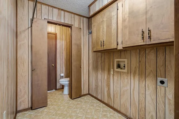 a view of an empty room with a fireplace