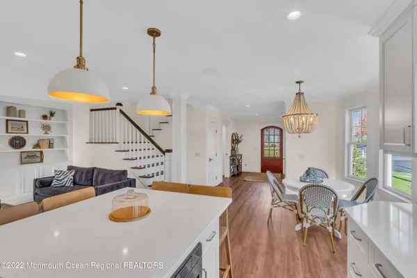 a view of a living room and dining room