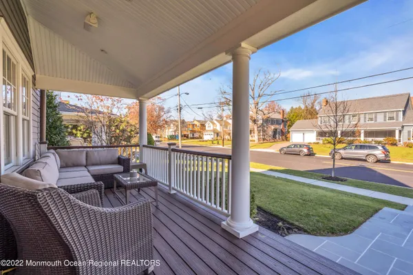 a view of a porch with furniture