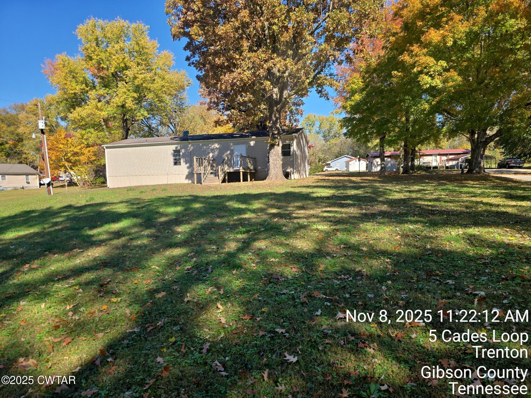 11 Cades Loop Trenton, TN 38382 - Photo 3 of 16 a view of a house with a yard