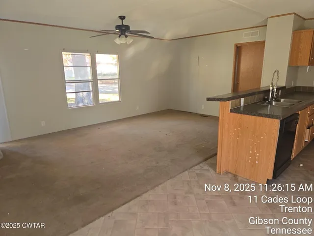 a view of a kitchen with a sink