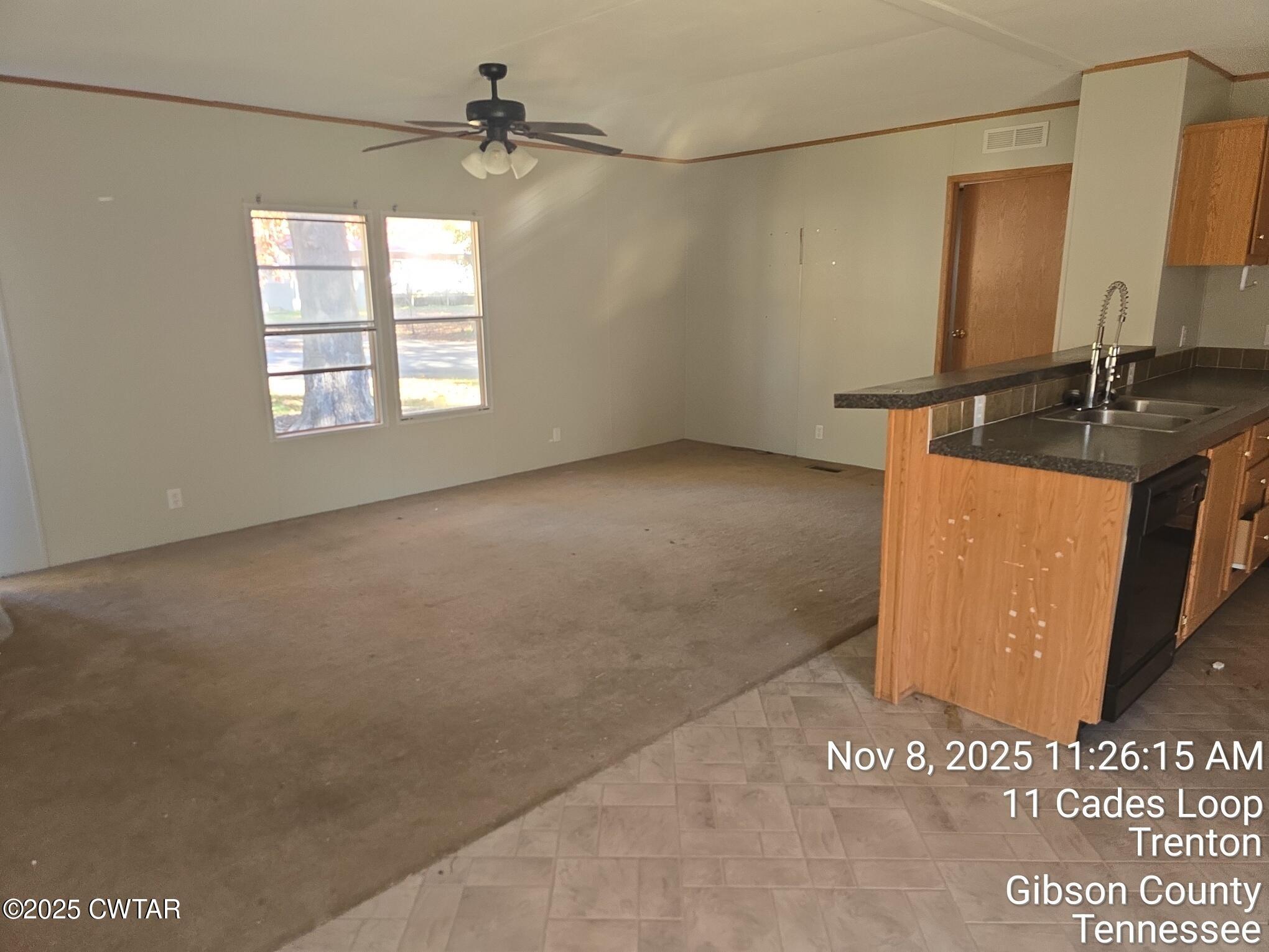 11 Cades Loop Trenton, TN 38382 - Photo 7 of 16 a view of a kitchen with a sink