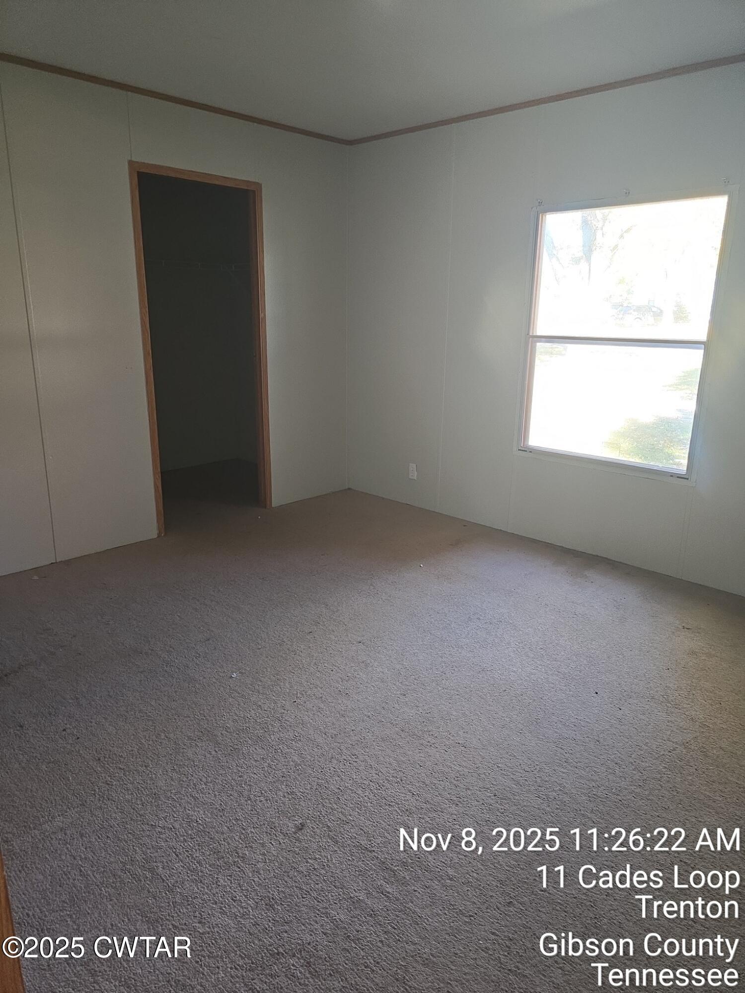 11 Cades Loop Trenton, TN 38382 - Photo 8 of 16 a view of an empty room with a window