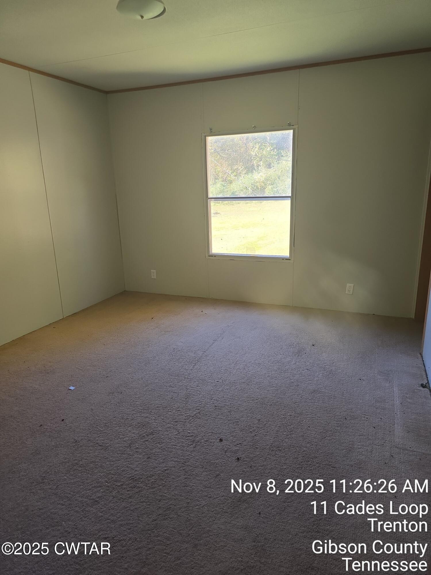 11 Cades Loop Trenton, TN 38382 - Photo 9 of 16 a view of an empty room with a window