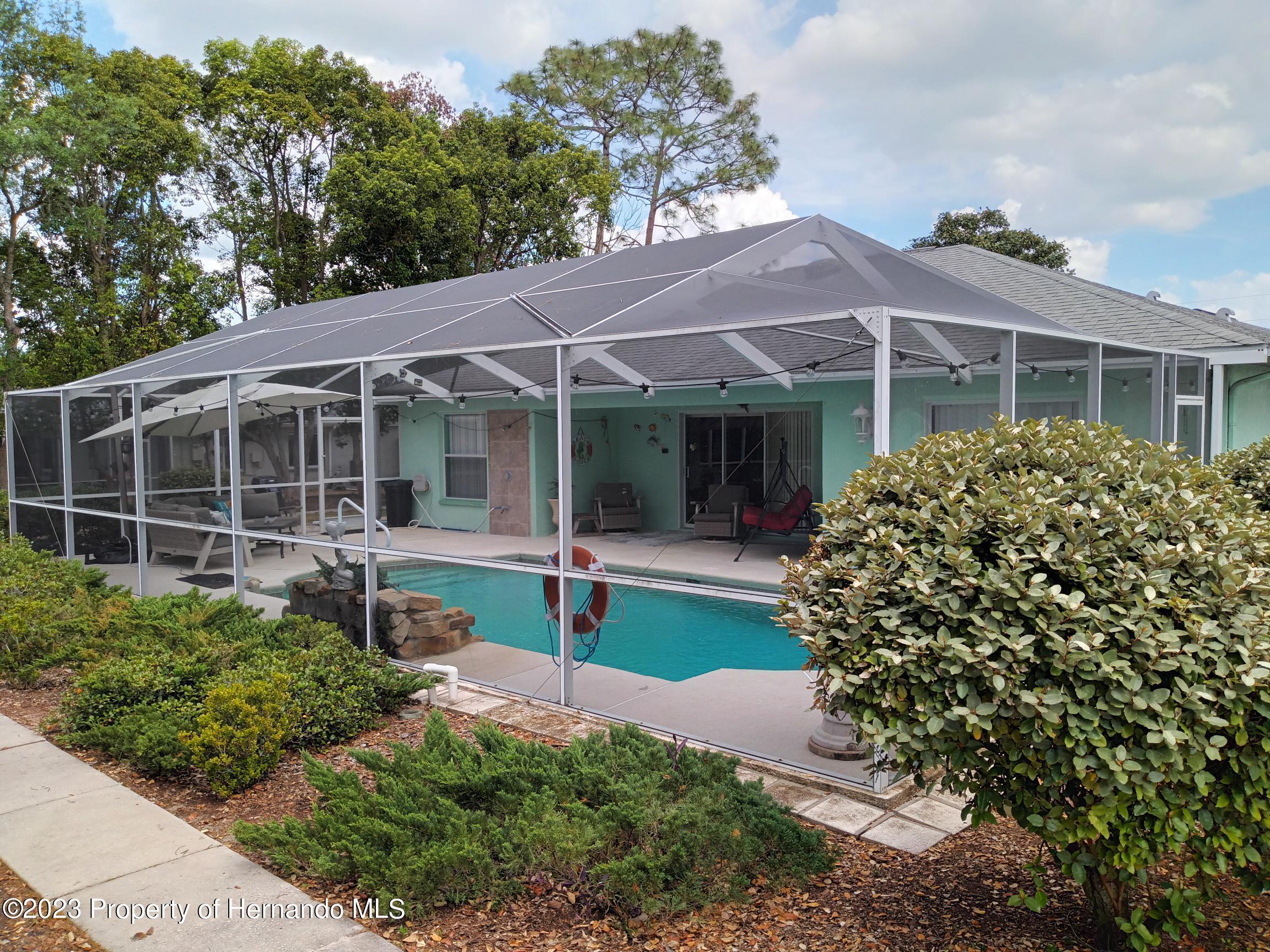 8513 Beach Road Spring Hill, FL 34606 - Photo 2 of 43