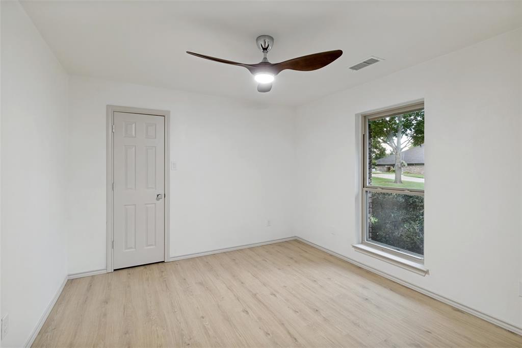 2607 Timberleaf Circle Carrollton, TX 75006 - Photo 22 of 34 Oversized bedroom with huge closet that goes to the jack and jill bathroom