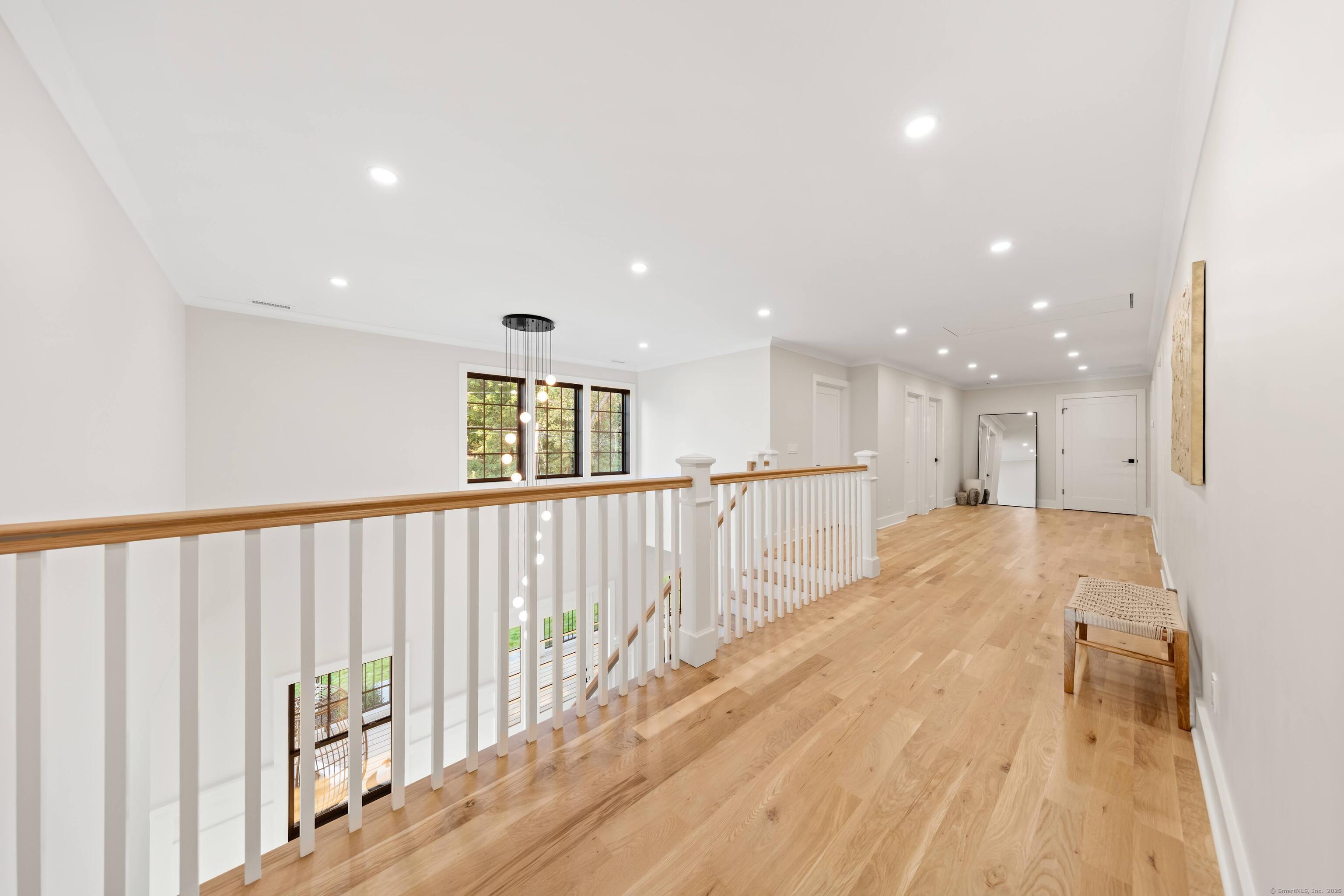 31 Gray Farms Road Stamford, CT 06905 - Photo 21 of 40 a view of hallway with wooden floor