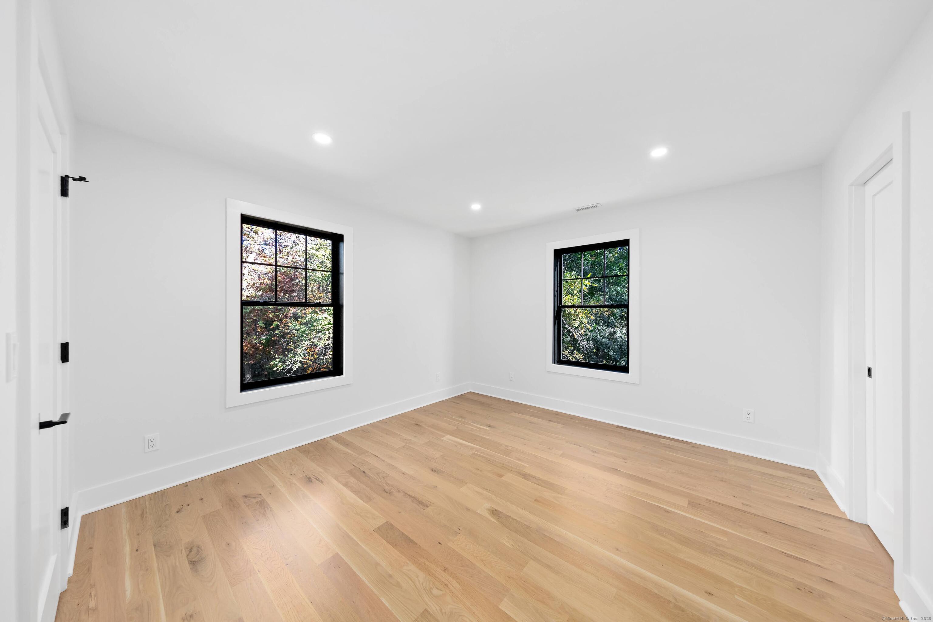 31 Gray Farms Road Stamford, CT 06905 - Photo 26 of 40 an empty room with windows